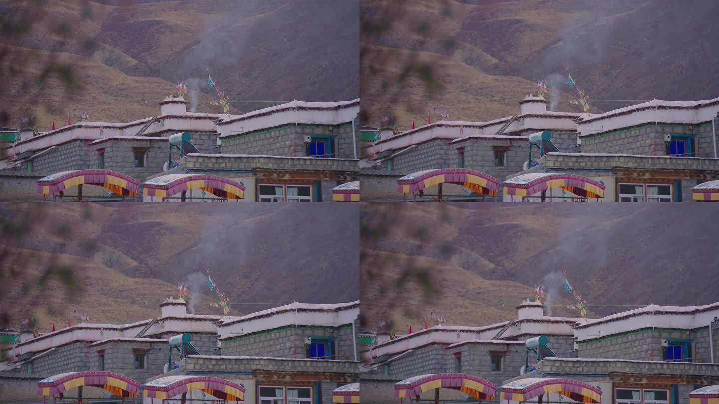 西藏农村民房炊烟升起
