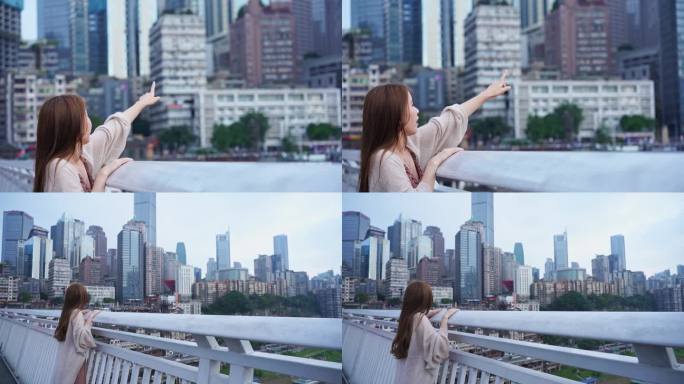 重庆江边，女生在跨江大桥上看风景