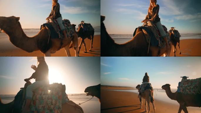 在海滩上骑骆驼和挥手的女游客很开心