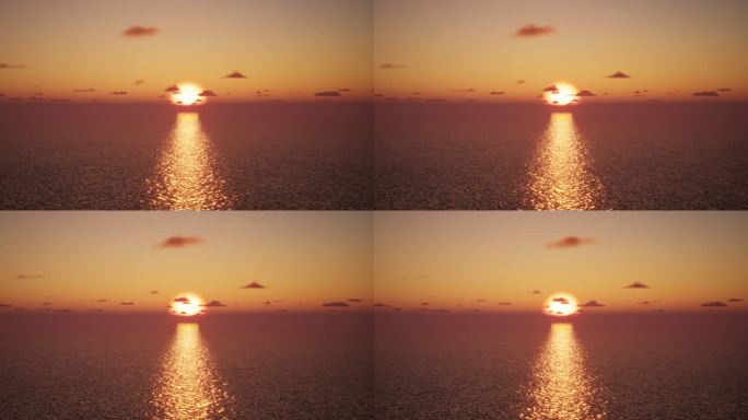 海上日出红色意境空镜头朝阳云彩海面波光