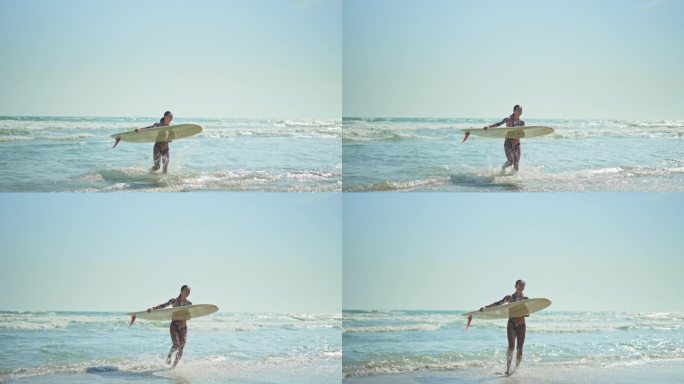女冲浪者带着长板离开海浪，慢镜头