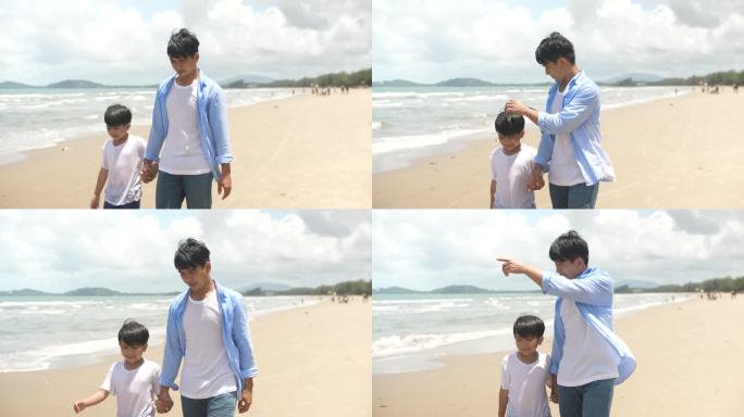 快乐的父亲和儿子在夏日的海滩上散步