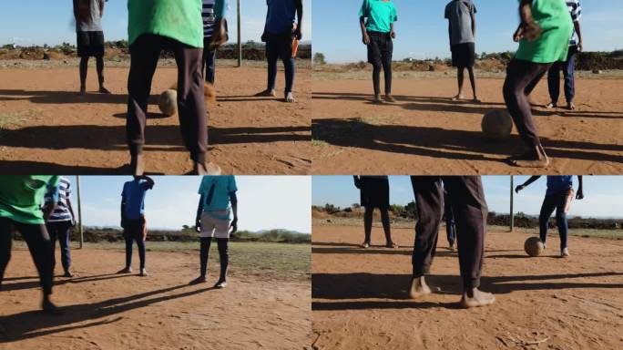贫困。裁剪的观点。贫穷的非洲黑人儿童在城镇贫民窟踢足球
