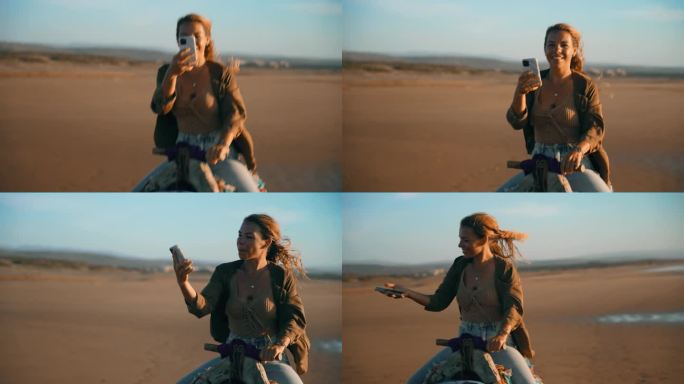 女游客在海滩骑骆驼自拍