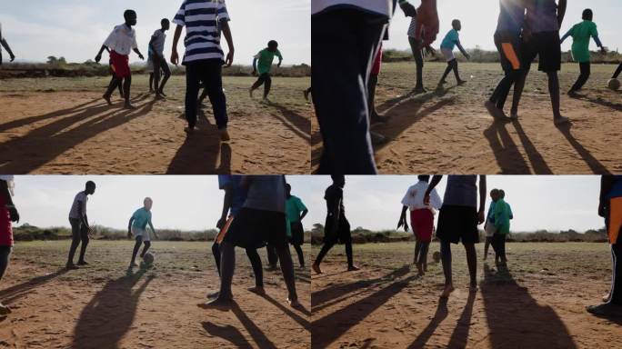 贫困。缓慢的运动。贫穷的非洲黑人儿童在城镇贫民窟踢足球。