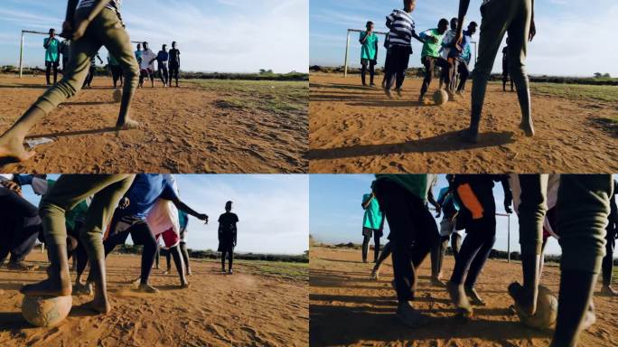 贫困。缓慢的运动。贫穷的非洲黑人儿童在城镇贫民窟踢足球。低角度视图