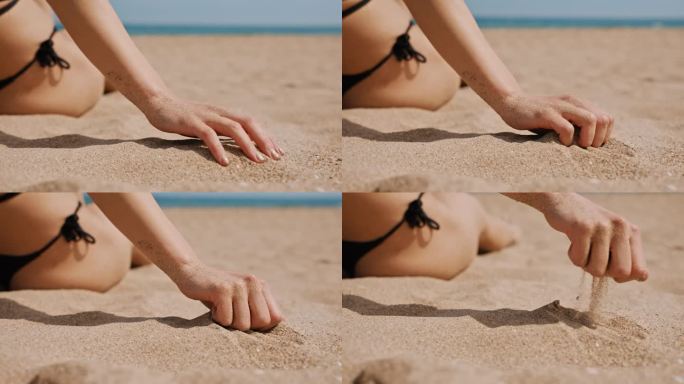 在阳光海滩上，女人的手握着沙子，倒着沙子。纯粹的假期快乐。