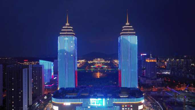 航拍双子星夜景蓝色调市政府大楼夜景