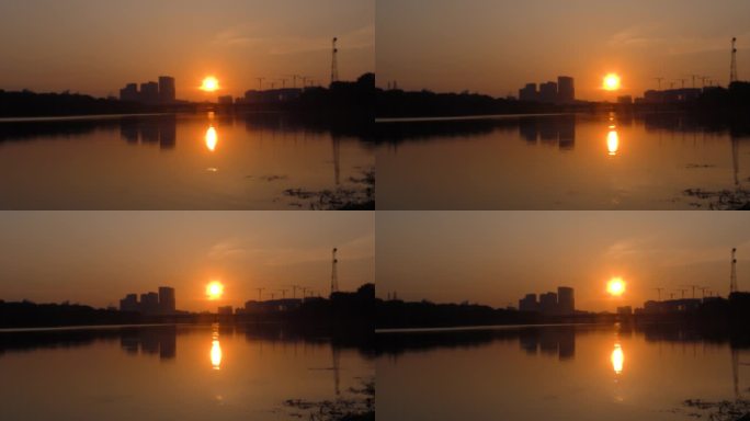 河边日出黎明凌晨水边水天一色东方红太阳升