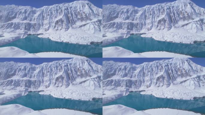 航拍侧视图蓝色高山蒂利科湖与雪山反射在水面上。尼泊尔。直达。世界上最高的高山湖泊