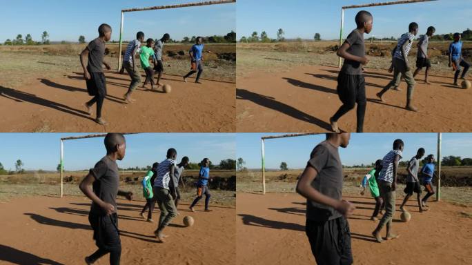 贫困。平移。贫穷的非洲黑人儿童在城镇贫民窟踢足球