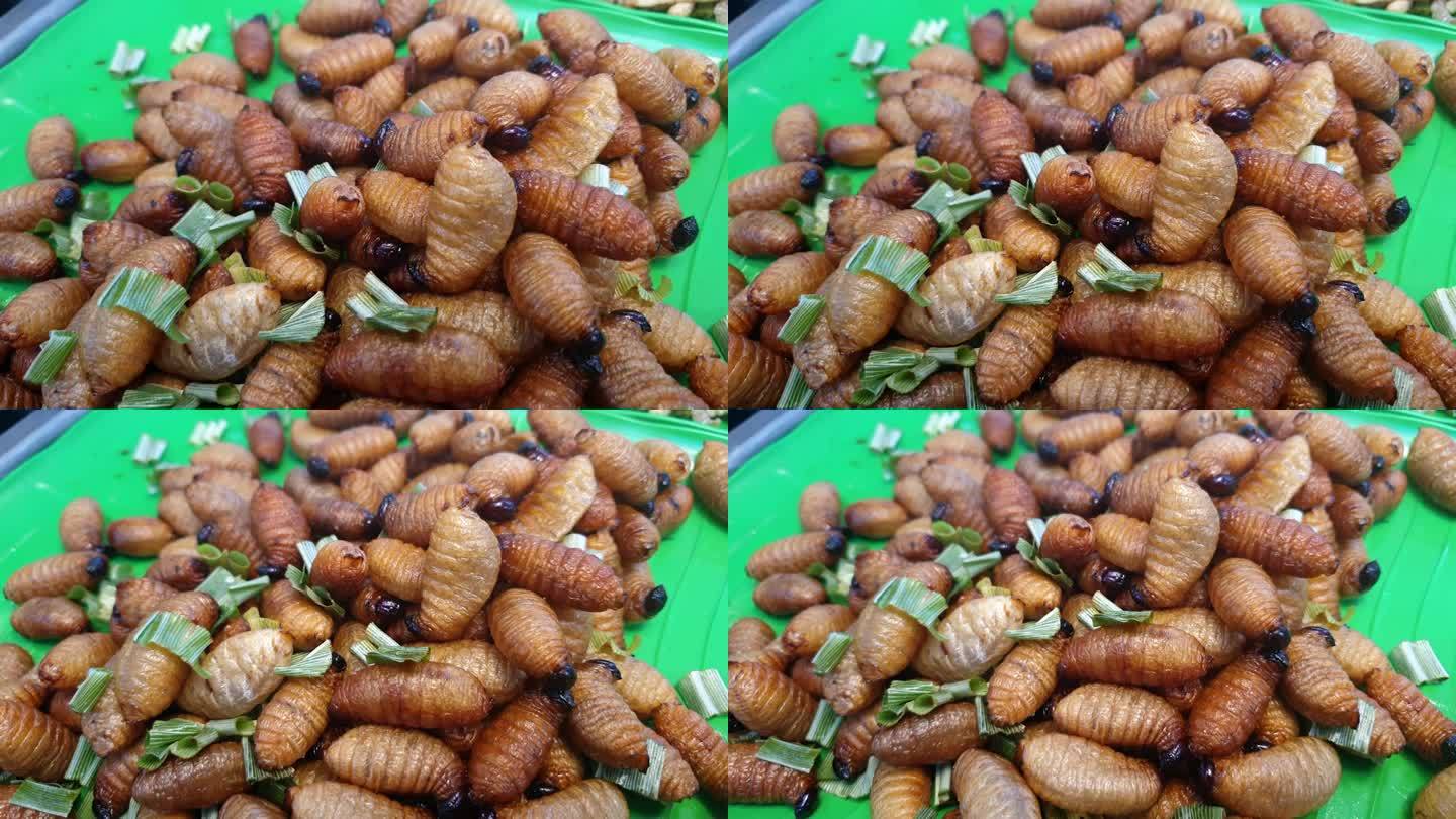 幼虫棕榈虫象鼻虫油炸肥虫小吃在东南亚市场销售的外来食品