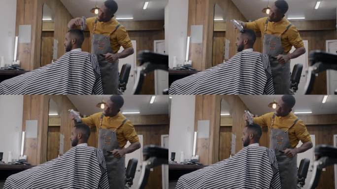 专业发型师在理发店为非裔美国客户做很酷的发型