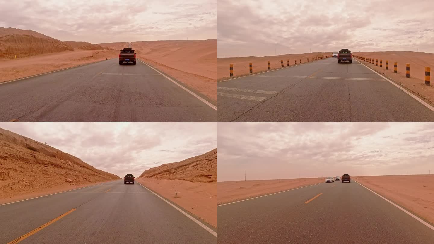 戈壁沙漠公路上行驶的汽车