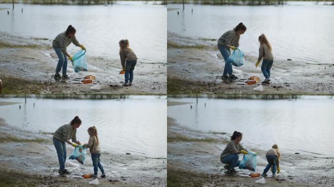 小女孩和她的妈妈清理湖泊的成本从塑料垃圾，环保，生态