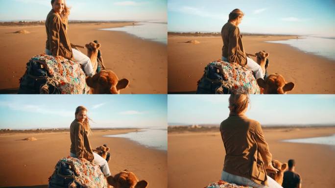 快乐的女游客在导游的带领下在沙滩上骑骆驼