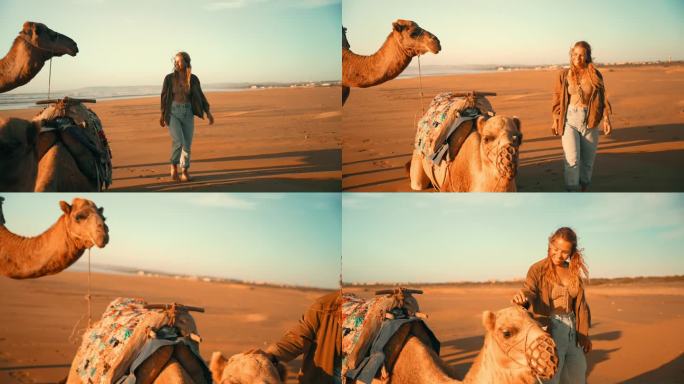 在撒哈拉沙漠的沙滩上，女游客抚摸骆驼
