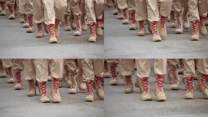 云军部队行进。沙漠制服。男性士兵。军事靴子。
