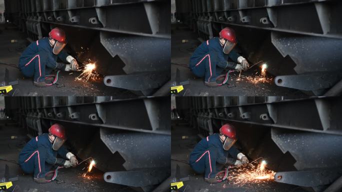 电焊电焊工人切割钢板火车货车车辆维修