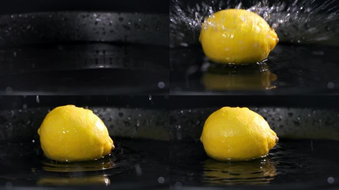 熟透的新鲜柠檬落入一盘水中，背景为深色，特写