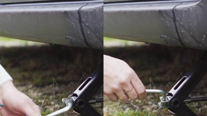 一个修指甲的女人换车轮、千斤顶、扳手、润滑油。垂直视频。