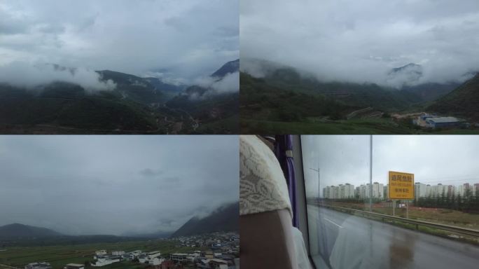车窗外的风景雨后山川大地云雾缭绕青山绿水