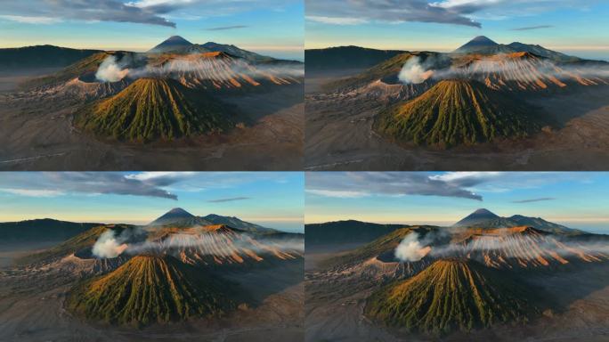 空中无人机日出场景移动的云，雾和烟雾的喷发覆盖火山Mts. Bromo, sememeru, Bat