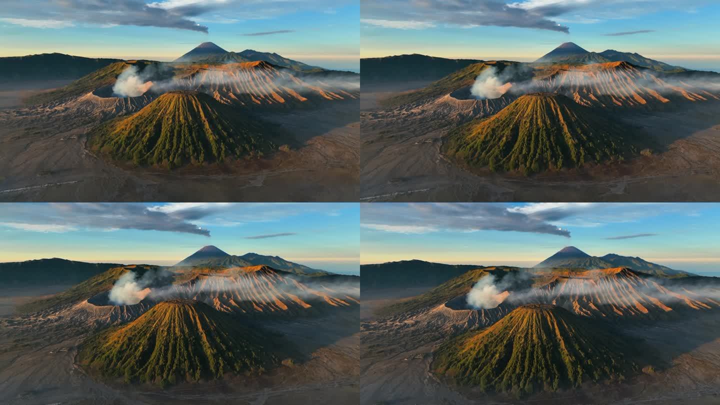 空中无人机日出场景移动的云，雾和烟雾的喷发覆盖火山Mts. Bromo, sememeru, Bat