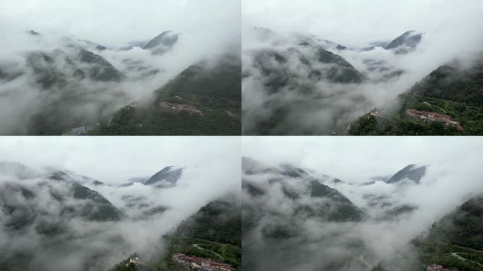 磨西古镇云雾缭绕的美景