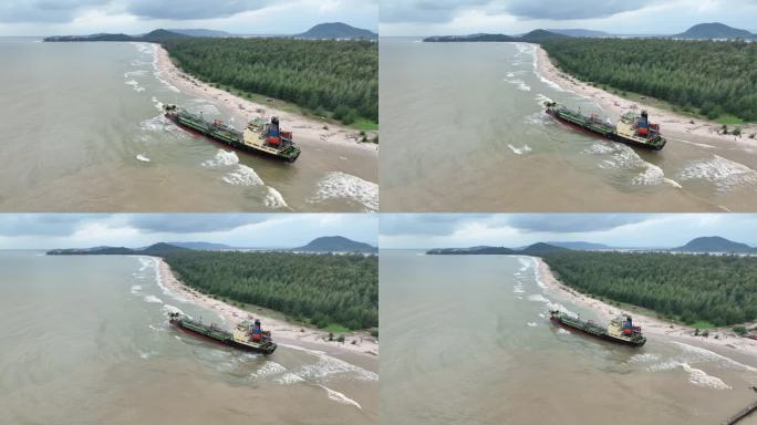 航拍无人机拍摄的画面:暴风雨过后，海浪将大型货船冲到靠近岛屿海岸的沙滩上