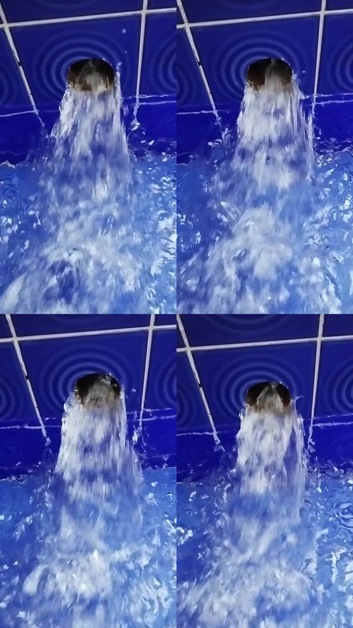 垂直视频画面显示水从过滤系统流出并返回游泳池。