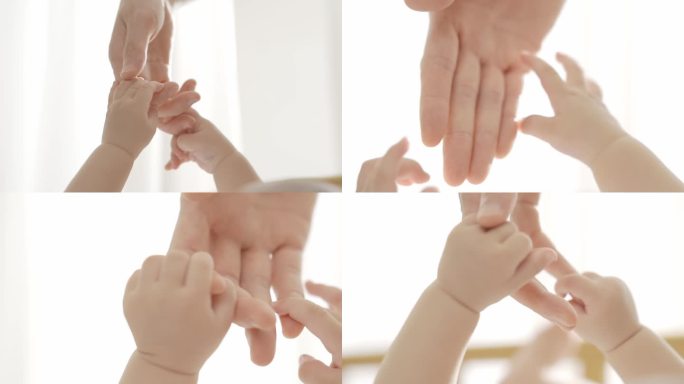婴儿的小手牵妈妈的手