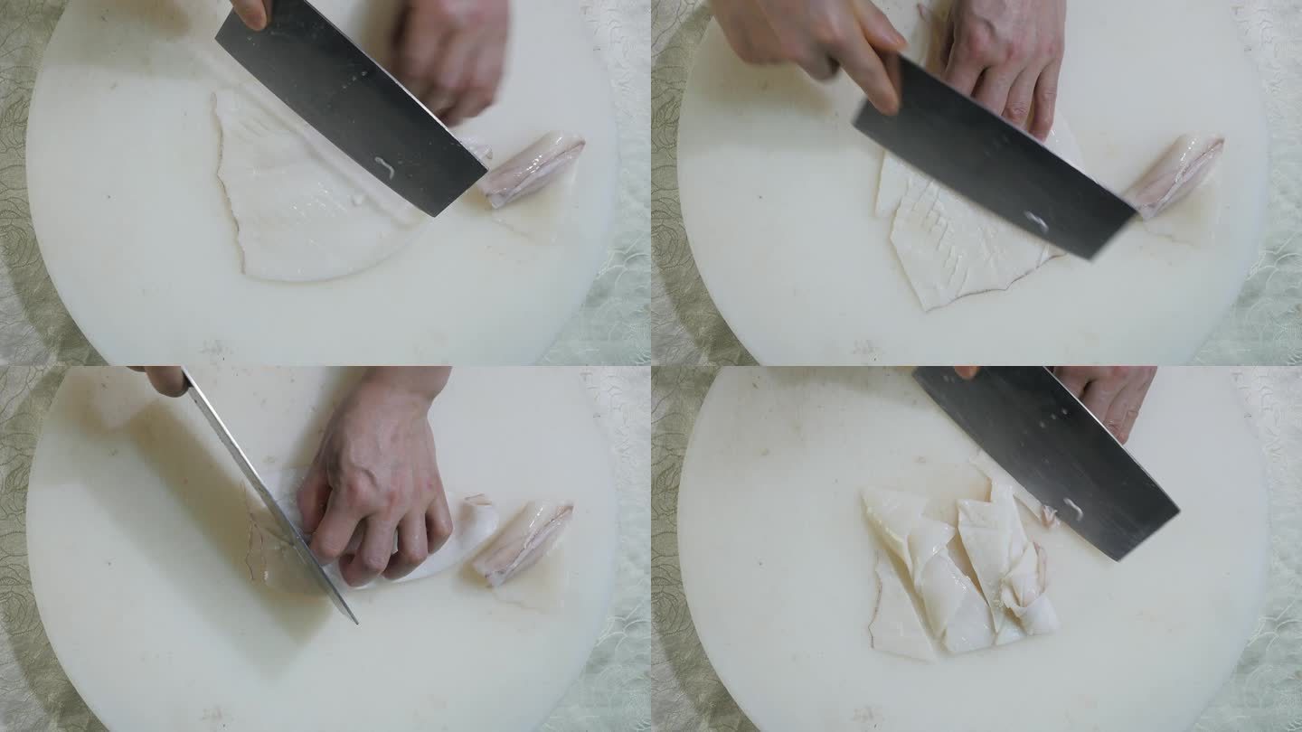 切鱿鱼白色案板刀工手部特写 海鲜处理做饭