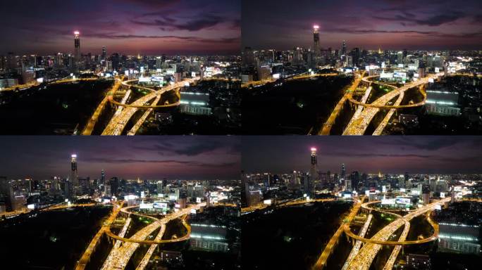 曼谷夜间高峰时段交通路口和道路的空中建筑施工
