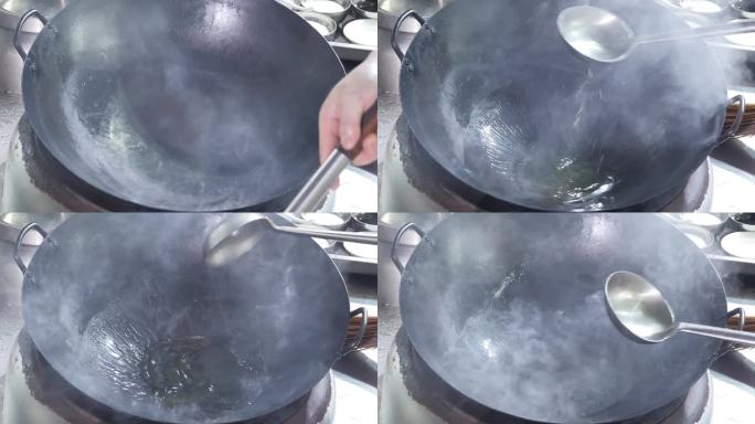 热锅烧油视频铁锅铁勺冒烟香油热油做菜做饭