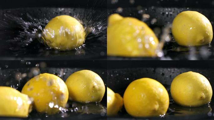 柑橘类水果，成熟的柠檬落入一盘水中，水花散落在不同的方向在一个黑暗的背景，特写