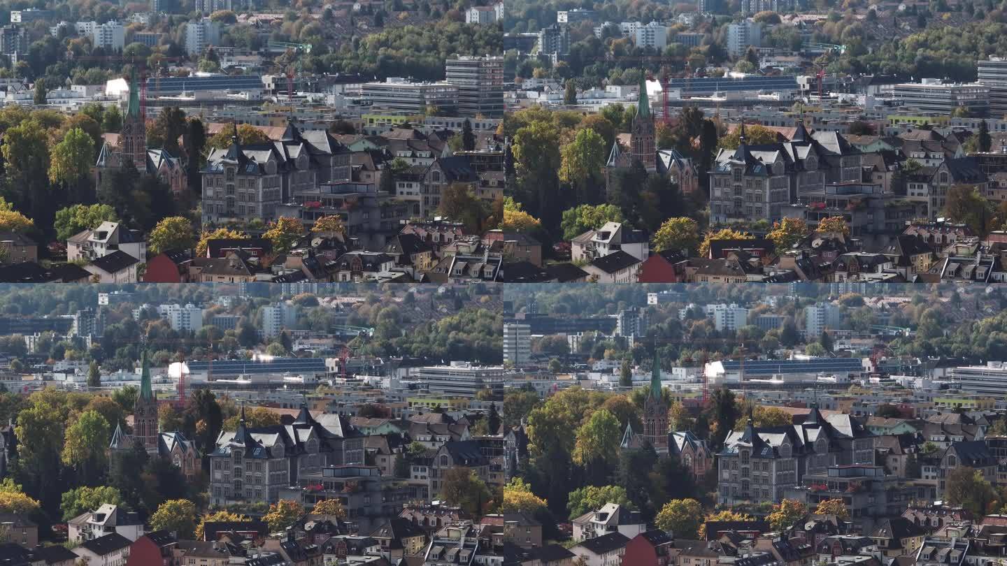 阳光明媚的一天飞越苏黎世市的老建筑前航拍全景4k瑞士