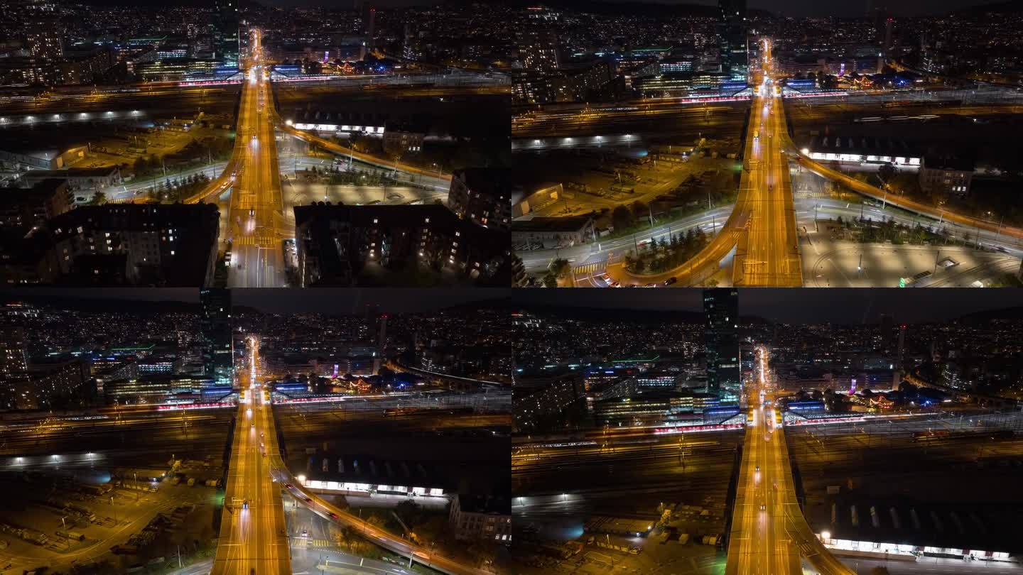 夜间苏黎世城市工业区交通街道大桥铁路火车站航拍全景4k延时瑞士