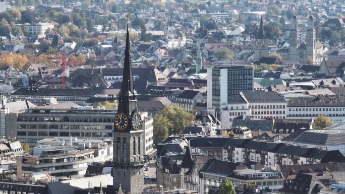 晴朗的一天苏黎世市中心著名的教堂塔航拍全景4k瑞士
