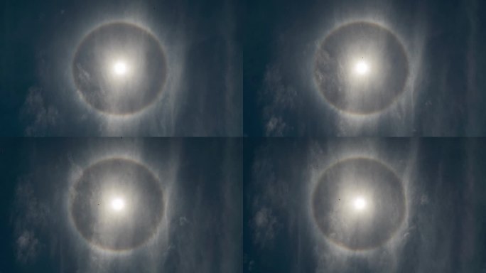 罕见的太阳周围的彩虹圆晕在蓝色天光天空时间推移光学现象