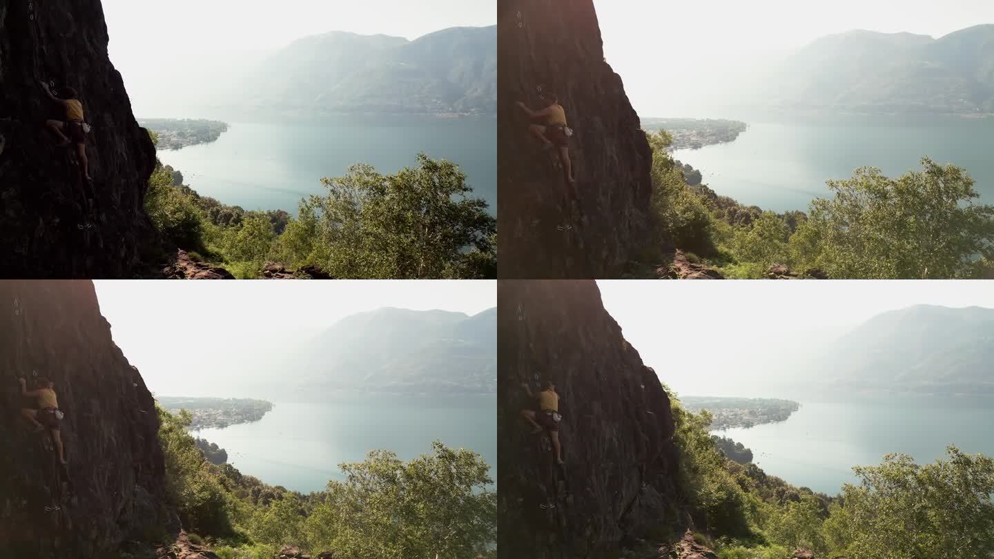 无人机拍摄，男子攀岩与令人惊叹的湖景
