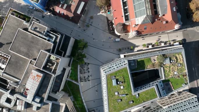 阳光明媚的日子斯图加特市中心屋顶空中俯视全景4k德国
