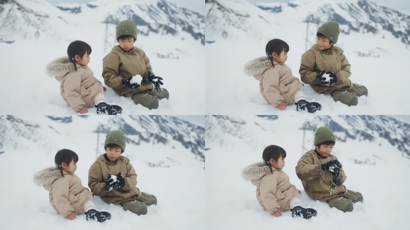 兄弟姐妹一起坐在雪山上，哥哥给妹妹堆了一个可爱的雪人。