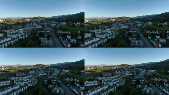 日落时间苏黎世莱姆巴赫阿德利斯威尔城市景观交通道路航拍全景4k瑞士