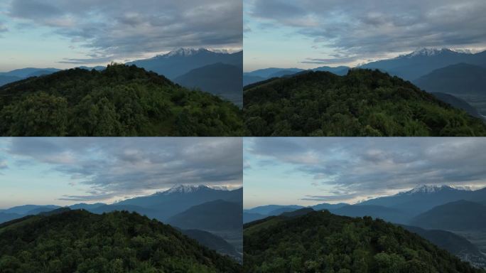 尼泊尔夏季日出时的大喜马拉雅鸟瞰图。史诗级无人机在喜马拉雅雪山中的飞行。