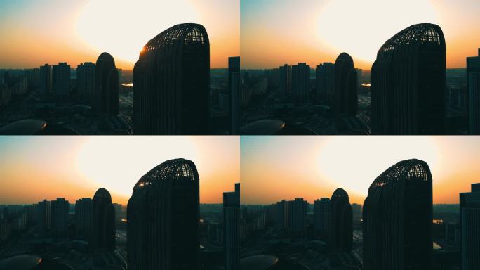 航拍4K夕阳点缀五彩世界高楼
