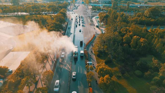 航拍4K城市道路清洁喷雾洒水车