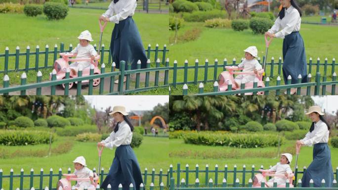 妈妈推着婴儿车逛公园