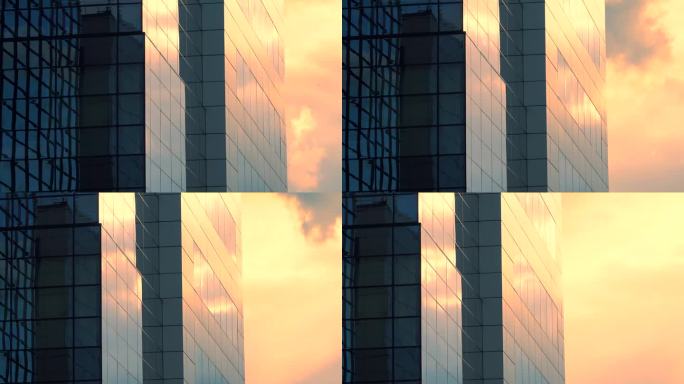 办公大楼，日落天空背景上的外景与彩色黄色和橙色的云，公共城市场景，平移，特写，延时，长曝光，多重曝光