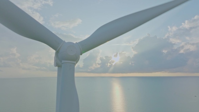 鸟瞰风力发电机领域的能源生产与蓝色晴朗的天空